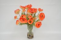 Orange Ranunculus Arrangement In Clear Vase