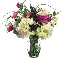 Helleborus and Roses Arrangement In a Clear Vase