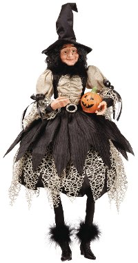 Witch Figurine Holding a Jack O Lantern