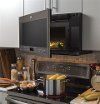 PVM9005BLTS GE Profile Series 2.1 Cu. Ft. Over-the-Range Sensor Microwave Oven - Black Stainless Steel-6