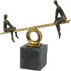 Black and Gold Teeter-Totter Sculpture with Kids