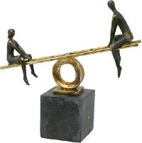 Black and Gold Teeter-Totter Sculpture with Kids