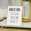 White and Black Hold On Metal Sign with Gold Frame