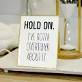 White and Black Hold On Metal Sign with Gold Frame