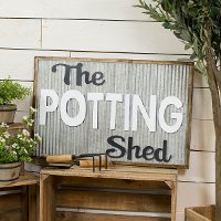 White, Black and Metal Potting Shed Sign