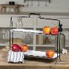 Black Metal Stand with Two Tiered White Trays