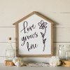 White, Black, and Brown Love Grows Here Sign