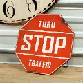 Red and White Metal Standing Stop Sign