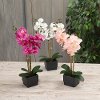Assorted Faux Orchid Flower Arrangement in Ceramic Pot