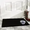 153601729 Grinning Skull Doormat