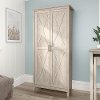 Key West Farmhouse Washed Gray 2-Door Tall Storage Cabinet
