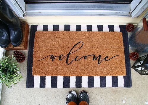 https://static.rcwilley.com/blog/34/7921/Trend-Alert-Layered-Rugs-On-The-Front-Porch-33978.jpg