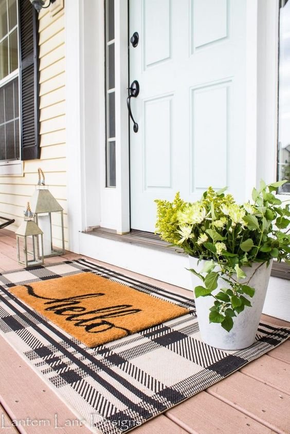https://static.rcwilley.com/blog/34/7921/Trend-Alert-Layered-Rugs-On-The-Front-Porch-78504.jpg