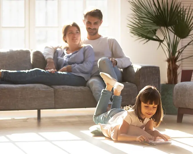 Family relaxing in their living room