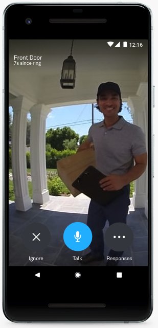 Phone showing a man delivering package at the door