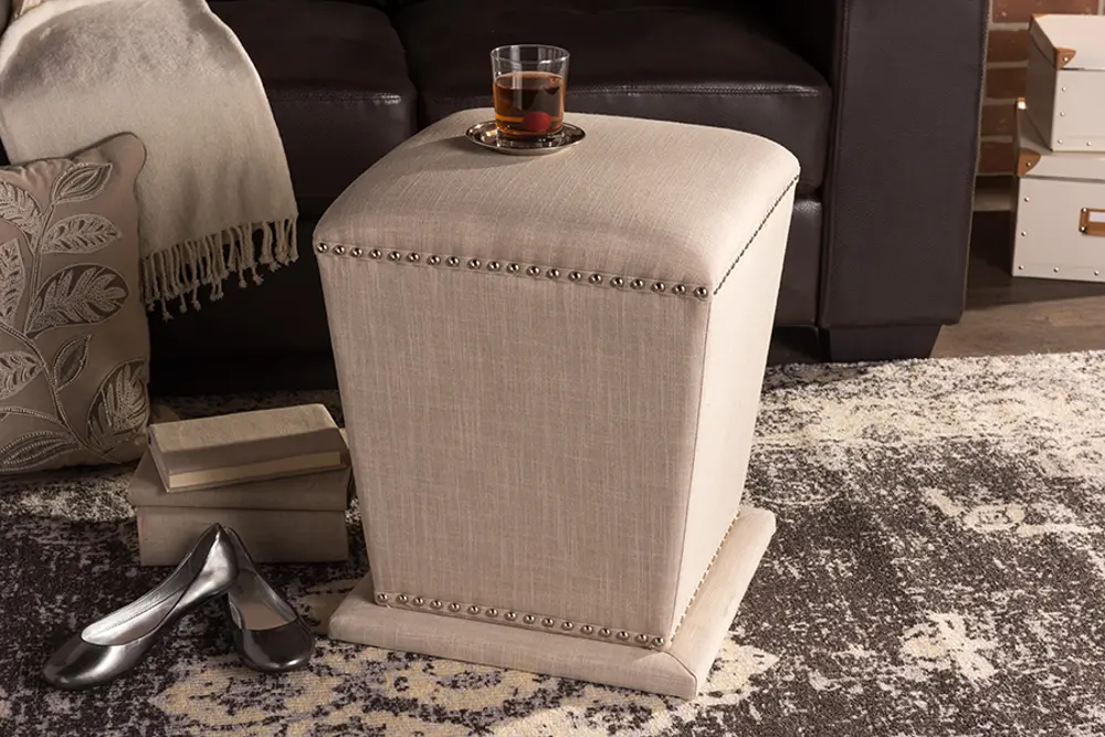 6714-RCW Beige Upholstered Ottoman With Nail Head Trim - Beverly-1