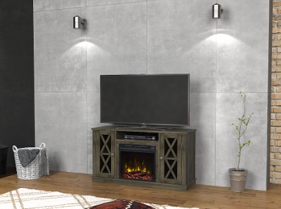 Modern Gray TV Stand with Fireplace (48 Inch) - Bayport | RC Willey Furniture Store RC Willey helps you update any room with this 48 inch modern grey TV stand with fireplace that accommodates most flat screen TVs up 55”. The Spanish grey finish and gun metal hardware will add a classical contemporary touch to your living space. Open medi