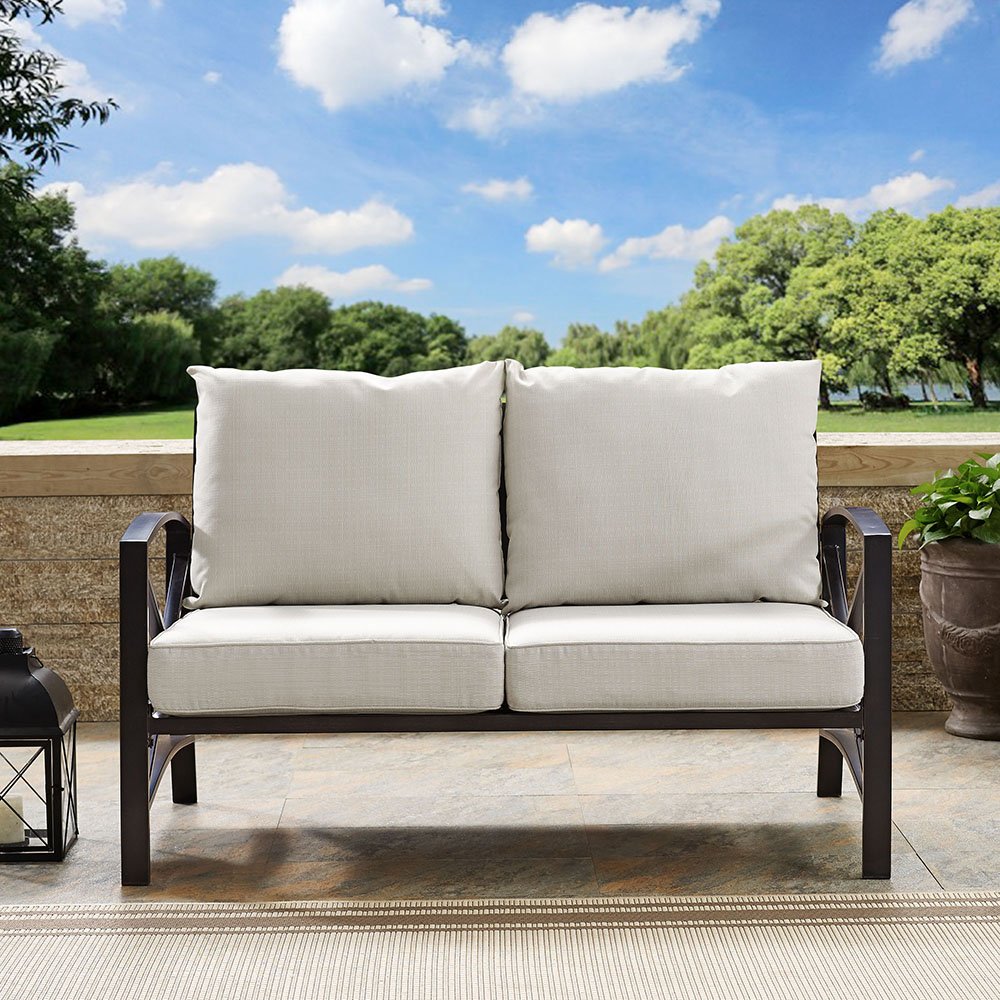 Kaplan Cream and Tan Patio Loveseat