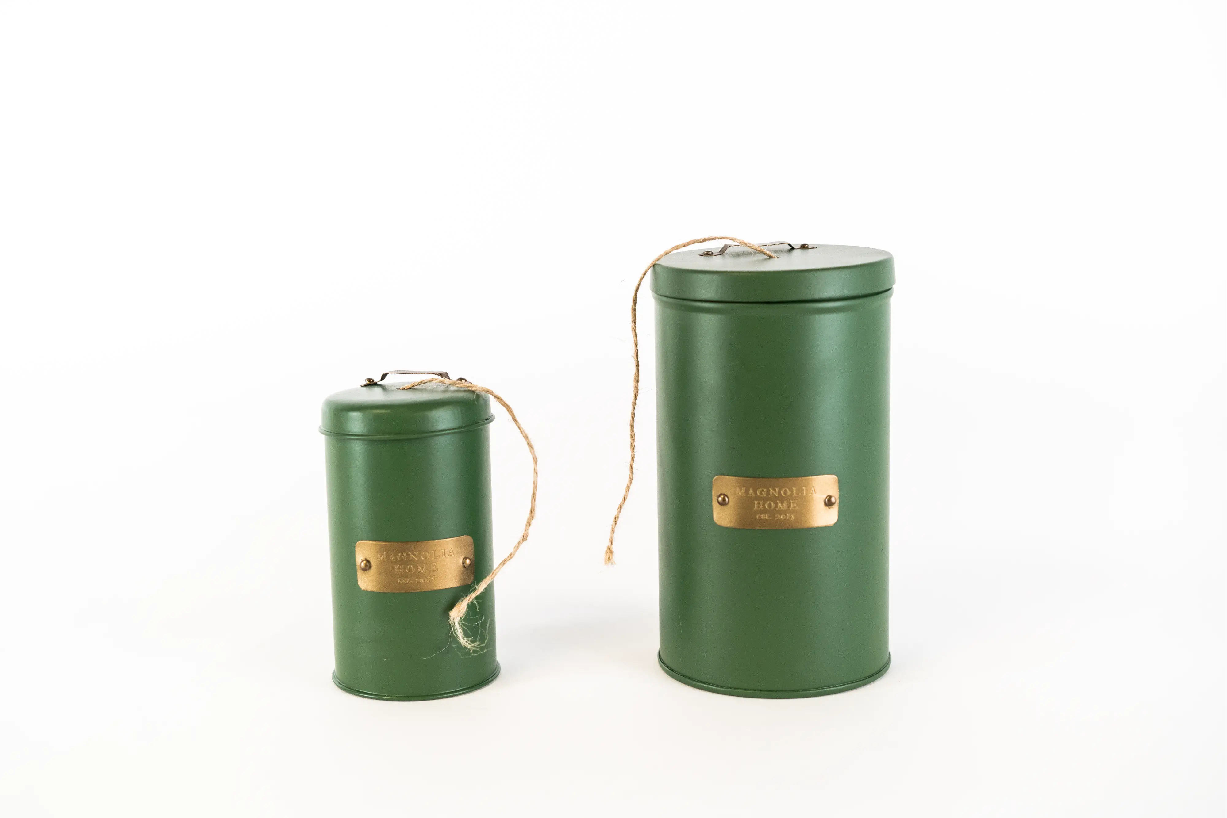 https://static.rcwilley.com/products/112019706/Magnolia-Home-Furniture-4-Inch-Green-and-Brass-Metal-Canister-rcwilley-image1.webp