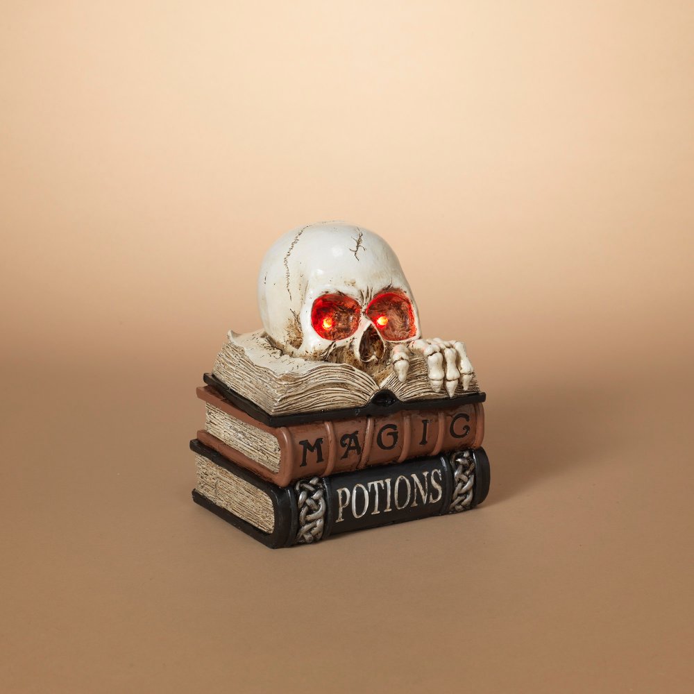 LIGHTED SKULL READING BOOK